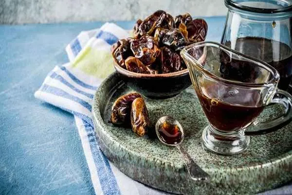 قیمت و خرید شیره خرمای درجه ۱ + فروش ارزان