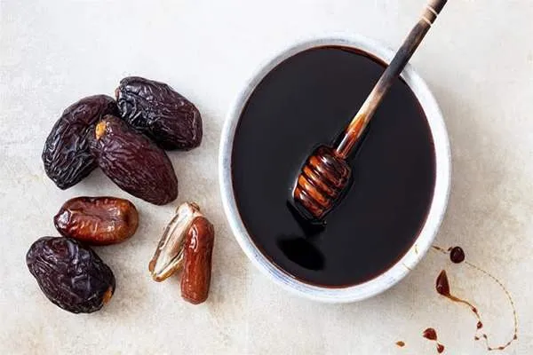 قیمت و خرید شیره خرمای درجه ۱ + فروش ارزان